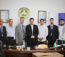 بنك الاسكان يتبرع بأجهزة حاسوب لجامعة القدس المفتوحة -  فرع يطا