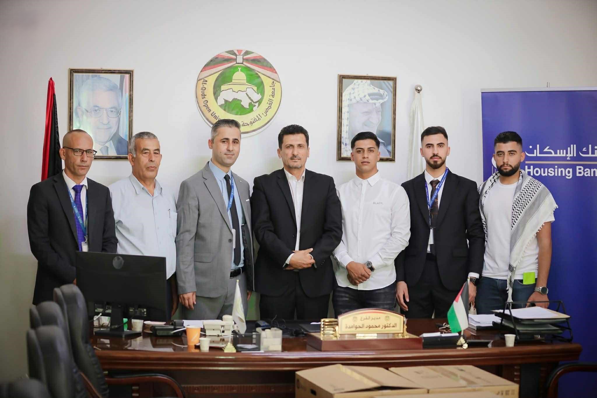 donates-computers-to-al-quds-open-university.jpg